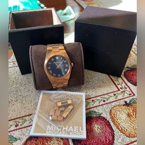Michael Kors unisex rose gold watch